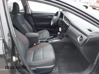 2019 Toyota Corolla L with VIN 5YFBURHE5KP945925, listed as a IAAI auction lot 41493079 with 96,849 mi miles and . Bid and sale history available at carsss.com. Image 5.