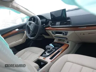 2023 Audi Q5 Premium Plus with VIN WA1BBAFY4P2067571, listed as a IAAI auction lot 41497906 with 21,713 mi miles and . Bid and sale history available at DreamBid. Image 5.