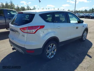 2013 Ford Escape SEL with VIN 1FMCU9H90DUC06857, listed as a IAAI auction lot 42026039 with 255,342 mi miles. Bid and sale history available at carsss.com. Image 4.