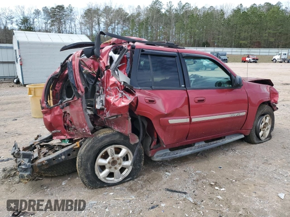 2003 GMC Envoy SLE with VIN 1GKDT13S332136423, listed as a Copart auction lot 49301635 with 148,669 mi miles and Salvage Title. Bid and sale history available at carsss.com. Image 3.