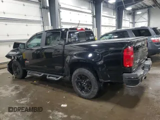 2021 Chevrolet Colorado 4WD Z71 with VIN 1GCGTDEN8M1171810, listed as a Copart auction lot 57409115 with 100,579 mi miles and Salvage title. Bid and sale history available at DreamBid. Image 2.
