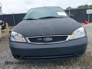 2007 Ford Focus S z VIN 1FAHP34NX7W188237, wystawiony jako IAAI lot #42122139 z przebiegiem 177 507 mil mil oraz . Historia ofert i sprzedaży dostępna na DreamBid. Obrazek 6.
