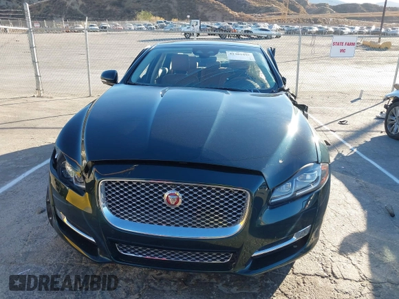 2019 Jaguar XJ Portfolio with VIN SAJWA2G70K8W18172, listed as a IAAI auction lot 41301895 with 13,037 mi miles and . Bid and sale history available at DreamBid. Image 12.
