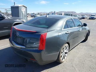 2014 Cadillac ATS Premium with VIN 1G6AE5SX4E0106197, listed as a IAAI auction lot 41720184 with 106,919 mi miles. Bid and sale history available at carsss.com. Image 4.