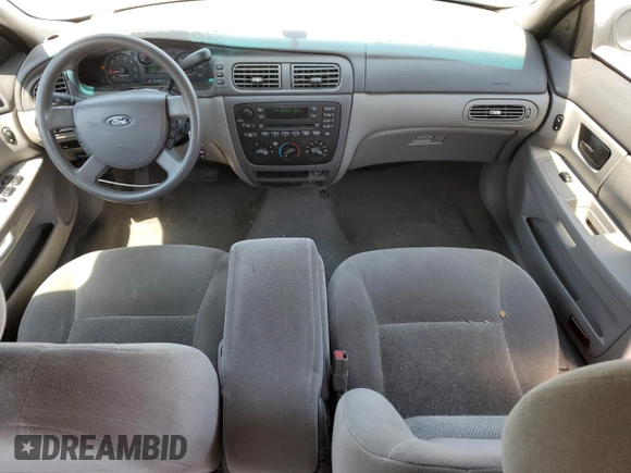 2006 Ford Taurus SE with VIN 1FAFP53UX6A194398, listed as a Copart auction lot 59582515 with 114,933 mi miles and Salvage title. Bid and sale history available at DreamBid. Image 8.