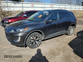 2020 Ford Escape SEL z VIN 1FMCU9H98LUA39419, wystawiony jako Copart lot #51360235 z przebiegiem 99 012 mil mil oraz Czysty tytuł • Clean title. Historia ofert i sprzedaży dostępna na DreamBid. Obrazek 1.