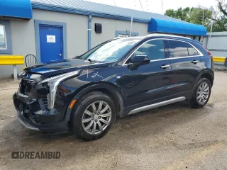 2020 Cadillac XT4 AWD Premium Luxury with VIN 1GYFZDR47LF088070, listed as a Copart auction lot 42802985 with 102,777 mi miles and Salvage Title. Bid and sale history available at carsss.com. Image 1.