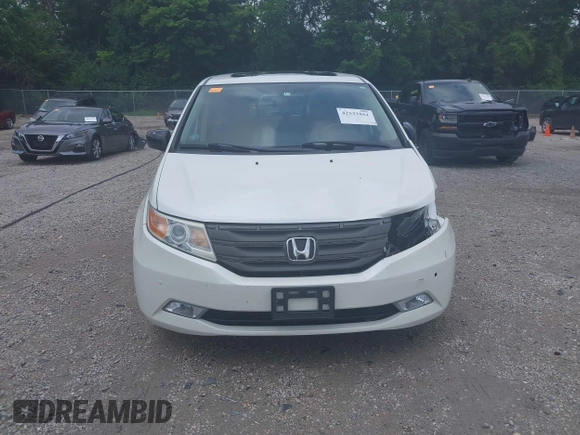 2013 Honda Odyssey Touring with VIN 5FNRL5H9XDB049390, listed as a IAAI auction lot 42532861 with 129,376 mi miles and . Bid and sale history available at DreamBid. Image 13.