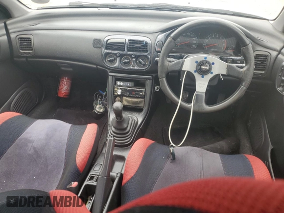 1995 Subaru Impreza with VIN GC8030988, listed as a Copart auction lot 70242354 with 123,696 mi miles and Salvage title. Bid and sale history available at DreamBid. Image 8.