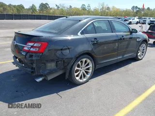 2015 Ford Taurus Limited with VIN 1FAHP2J81FG134973, listed as a IAAI auction lot 41845384 with 139,203 mi miles. Bid and sale history available at carsss.com. Image 4.