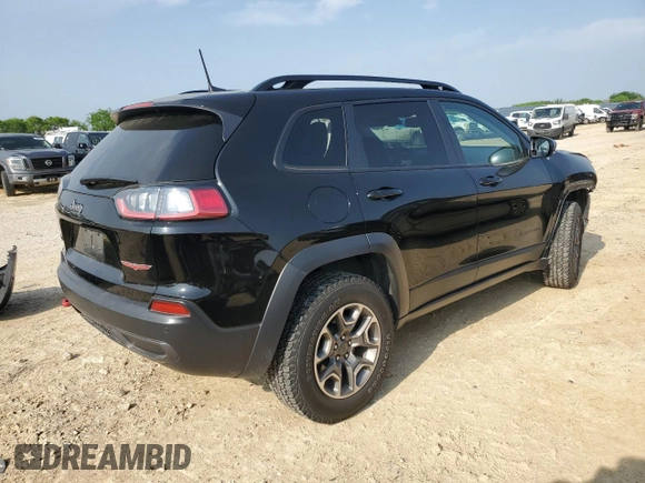 2022 Jeep Cherokee Trailhawk с VIN 1C4PJMBX8ND502686, выставлен на аукционе Copart как лот 51180645 с пробегом 62 865 миль миль и Списание • Salvage title. История ставок и продаж доступна на DreamBid. Изображение 3.