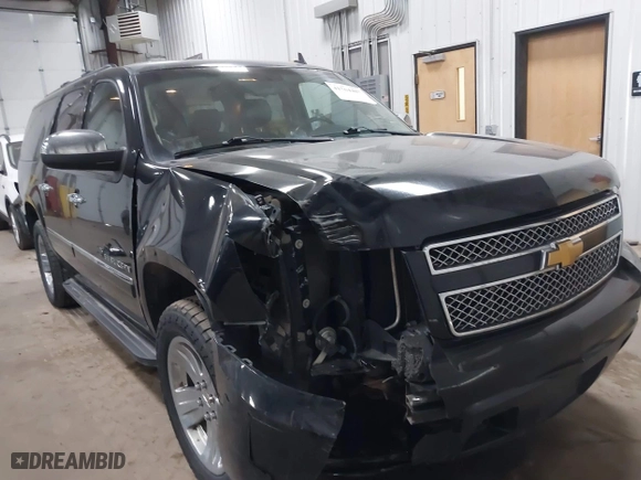2012 Chevrolet Suburban LTZ with VIN 1GNSKKE77CR326924, listed as a IAAI auction lot 41764487 with 198,224 mi miles. Bid and sale history available at carsss.com. Image 6.