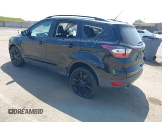 2017 Ford Escape SE with VIN 1FMCU0G9XHUE37185, listed as a IAAI auction lot 42053979 with 72,904 mi miles. Bid and sale history available at carsss.com. Image 3.