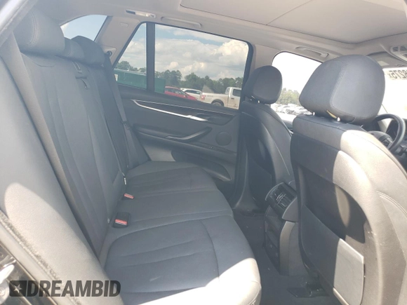 2016 BMW X5 xDrive35i z VIN 5UXKR0C52G0P26716, wystawiony jako Copart lot #56028275 z przebiegiem 128 355 mil mil oraz Szkoda całkowita • Salvage title. Historia ofert i sprzedaży dostępna na DreamBid. Obrazek 11.