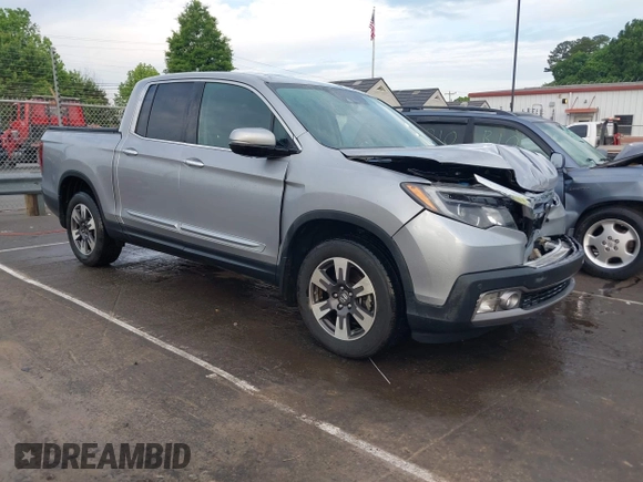 2019 Honda Ridgeline RTL-E with VIN 5FPYK3F72KB026100, listed as a IAAI auction lot 42205910 with 78,359 mi miles and . Bid and sale history available at DreamBid. Image 1.