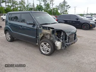 2011 Kia Soul + with VIN KNDJT2A29B7346601, listed as a IAAI auction lot 42128954 with 247,952 mi miles. Bid and sale history available at carsss.com. Image 1.