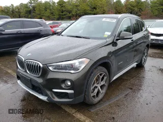 2018 BMW X1 xDrive28i with VIN WBXHT3C37J5K26738, listed as a Copart auction lot 35778903 with 34,916 mi miles. Bid and sale history available at carsss.com. Image 1.