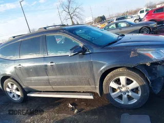 2016 Chevrolet Traverse LT with VIN 1GNKRGKD9GJ301823, listed as a IAAI auction lot 41374254 with 145,235 mi miles and . Bid and sale history available at DreamBid. Image 13.