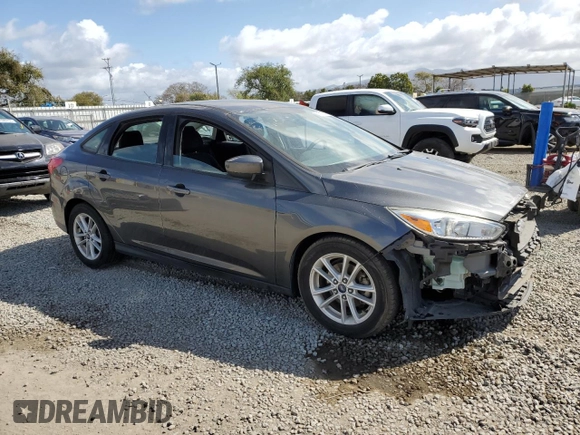 2018 Ford Focus SE with VIN 1FADP3F24JL231626, listed as a Copart auction lot 51015275 with 97,054 mi miles and Salvage Title. Bid and sale history available at carsss.com. Image 4.