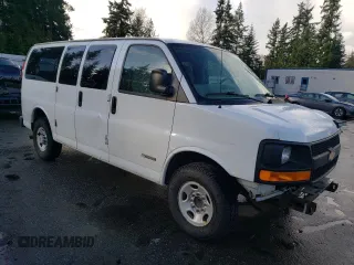 2005 Chevrolet Express Passenger with VIN 1GAHG35U551121466, listed as a Copart auction lot 80658034 with 84,598 mi miles and Salvage title. Bid and sale history available at DreamBid. Image 4.