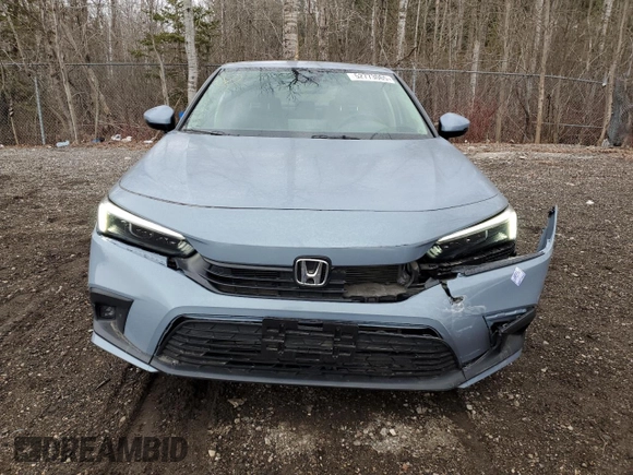 2023 Honda Civic Touring z VIN 2HGFE1F93PH002825, wystawiony jako Copart lot #52773065 z przebiegiem 20 659 mil mil oraz Szkoda całkowita • Salvage title. Historia ofert i sprzedaży dostępna na DreamBid. Obrazek 5.