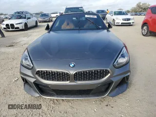 2020 BMW Z4 sDriveM40i with VIN WBAHF9C04LWW40647, listed as a Copart auction lot 77301284 with 0 mi miles and Salvage Title. Bid and sale history available at carsss.com. Image 5.
