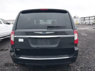 2015 Chrysler Town & Country Touring with VIN 2C4RC1BG1FR534220, listed as a IAAI auction lot 41489371 with 136,923 mi miles. Bid and sale history available at carsss.com. Image 16.