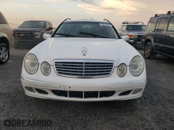 2004 Mercedes-Benz E 320 with VIN WDBUH65J64A428426, listed as a Copart auction lot 75079234 with 186,980 mi miles and Salvage Title. Bid and sale history available at DreamBid. Image 5.