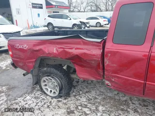2011 Ford Ranger XLT with VIN 1FTLR4FE2BPA59882, listed as a IAAI auction lot 41399564 with 139,087 mi miles. Bid and sale history available at carsss.com. Image 6.