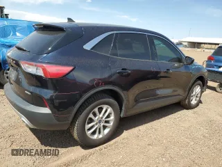 2021 Ford Escape SE with VIN 1FMCU9G66MUA94797, listed as a Copart auction lot 60864235 with 64,712 mi miles and Salvage title. Bid and sale history available at DreamBid. Image 3.