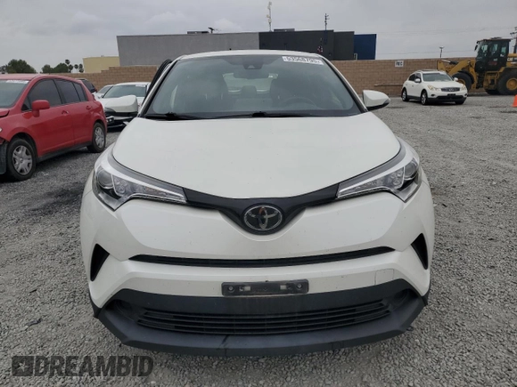 2019 Toyota C-HR XLE with VIN JTNKHMBX9K1059561, listed as a Copart auction lot 53568795 with 58,912 mi miles and Salvage Title. Bid and sale history available at DreamBid. Image 5.