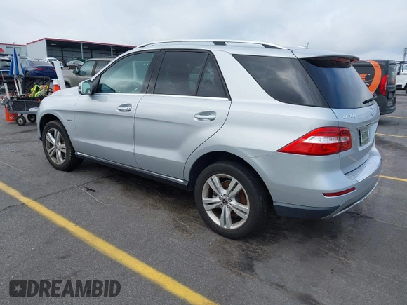 2012 Mercedes-Benz M ML 350 with VIN 4JGDA5HB5CA012821, listed as a IAAI auction lot 42128070 with 94,749 mi miles. Bid and sale history available at carsss.com. Image 3.