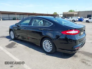 2016 Ford Fusion SE Hybrid with VIN 3FA6P0LU9GR405102, listed as a IAAI auction lot 42358807 with 91,130 mi miles and . Bid and sale history available at DreamBid. Image 3.