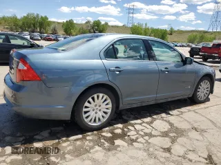 2012 Ford Fusion Hybrid z VIN 3FADP0L3XCR176552, wystawiony jako Copart lot #55787415 z przebiegiem 156 806 mil mil oraz Szkoda całkowita • Salvage title. Historia ofert i sprzedaży dostępna na DreamBid. Obrazek 3.
