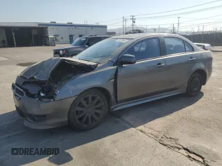 2009 Mitsubishi Lancer GTS with VIN JA3AU86W59U001099, listed as a Copart auction lot 73023864 with 200,554 mi miles and Salvage Title. Bid and sale history available at carsss.com. Image 1.
