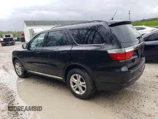 2012 Dodge Durango Crew with VIN 1C4RDJDG0CC322424, listed as a Copart auction lot 55677295 with 208,999 mi miles and Clean Title. Bid and sale history available at DreamBid. Image 2.