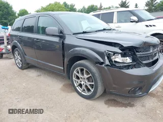 2015 Dodge Journey R/T with VIN 3C4PDDEG7FT677557, listed as a IAAI auction lot 42454924 with 102,591 mi miles and . Bid and sale history available at DreamBid. Image 1.
