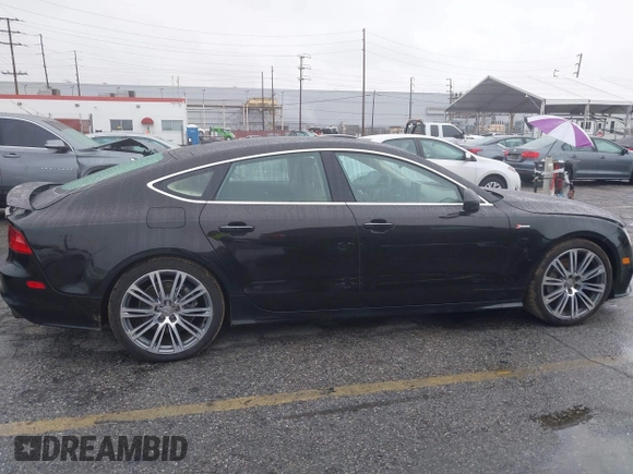 2014 Audi A7 3.0 Prestige with VIN WAU2GAFC5EN090233, listed as a IAAI auction lot 41565942 with 199,890 mi miles. Bid and sale history available at carsss.com. Image 14.
