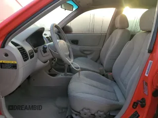 2005 Hyundai Accent GLS with VIN KMHCG45C15U596671, listed as a Copart auction lot 74834004 with 0 mi miles and Salvage Title. Bid and sale history available at carsss.com. Image 7.