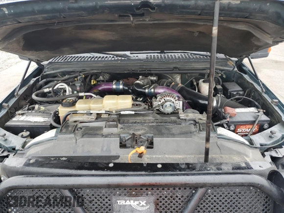 1999 Ford F-250 XL with VIN 1FTNX20FXXEA40858, listed as a Copart auction lot 63296925 with 368,565 mi miles and Salvage title. Bid and sale history available at DreamBid. Image 11.