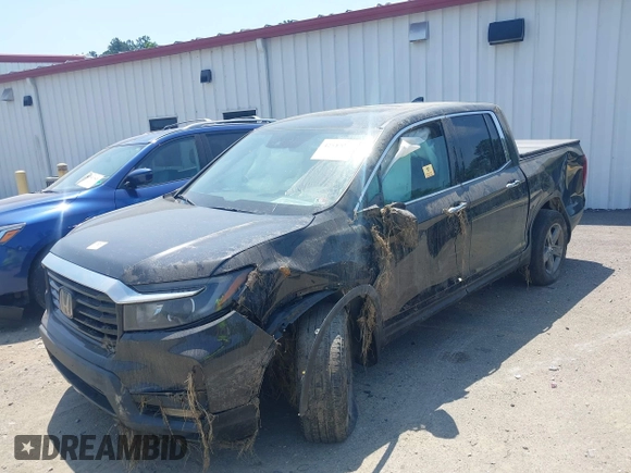 2022 Honda Ridgeline RTL-E with VIN 5FPYK3F75NB020232, listed as a IAAI auction lot 42549034 with 40,209 mi miles and . Bid and sale history available at DreamBid. Image 6.