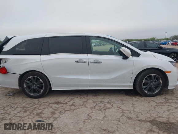 2022 Honda Odyssey Elite z VIN 5FNRL6H96NB039950, wystawiony jako IAAI lot #41907106 z przebiegiem 67 490 mil mil oraz . Historia ofert i sprzedaży dostępna na DreamBid. Obrazek 13.