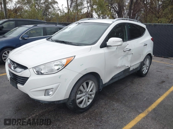 2013 Hyundai Tucson GLS with VIN KM8JU3AC4DU675511, listed as a IAAI auction lot 40765852 with 147,061 mi miles. Bid and sale history available at carsss.com. Image 2.