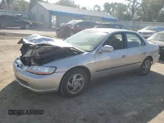 1999 Honda Accord LX z VIN JHMCG5544XC008224, wystawiony jako Copart lot #76618724 z przebiegiem 245 014 mil mil oraz Szkoda całkowita • Salvage title. Historia ofert i sprzedaży dostępna na DreamBid. Obrazek 1.