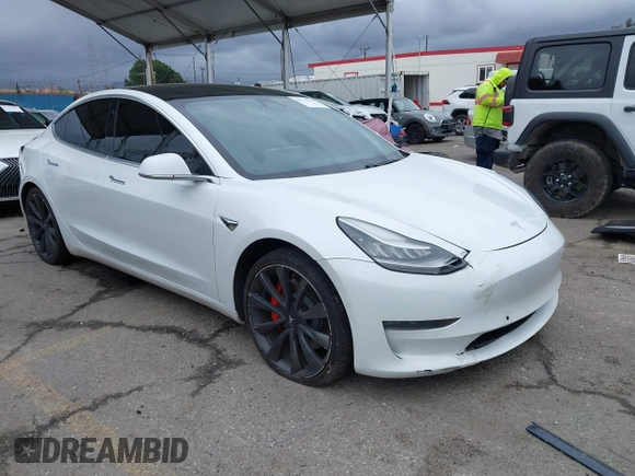 2020 Tesla Model 3 Performance z VIN 5YJ3E1EC4LF625109, wystawiony jako IAAI lot #41735149 z przebiegiem 95 010 mil mil oraz . Historia ofert i sprzedaży dostępna na DreamBid. Obrazek 1.