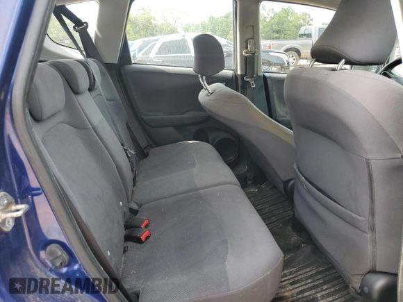 2009 Honda Fit with VIN JHMGE882X9S007865, listed as a Copart auction lot 61025875 with 159,919 mi miles and Clean title. Bid and sale history available at DreamBid. Image 10.