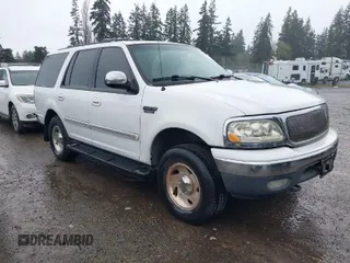 1999 Ford Expedition XLT z VIN 1FMPU18L5XLA15931, wystawiony jako IAAI lot #41952949 z przebiegiem 197 134 mil mil oraz . Historia ofert i sprzedaży dostępna na DreamBid. Obrazek 1.