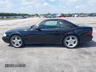 2001 Mercedes-Benz SL-Class with VIN WDBFA68F71F196390, listed as a IAAI auction lot 42128119 with 65,010 mi miles. Bid and sale history available at carsss.com. Image 14.