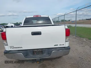 2012 Toyota Tundra with VIN 5TFUW5F16CX225421, listed as a IAAI auction lot 42210783 with 207,025 mi miles and . Bid and sale history available at DreamBid. Image 16.