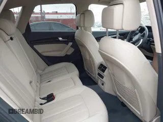 2019 Audi Q5 Premium Plus z VIN WA1BNAFY5K2049080, wystawiony jako IAAI lot #42057631 z przebiegiem 94 767 mil mil oraz . Historia ofert i sprzedaży dostępna na DreamBid. Obrazek 8.